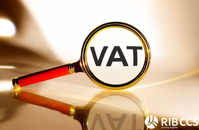 Magnifying glass with the word VAT in the middle