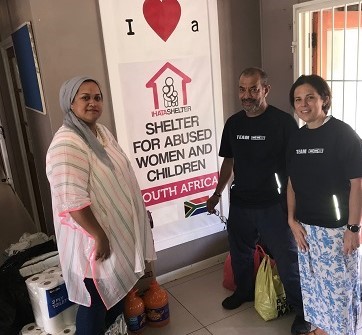 Charity donation at a woman's shelter